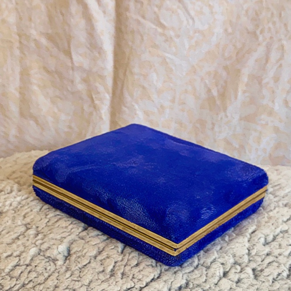 Small blue velvet earring holder